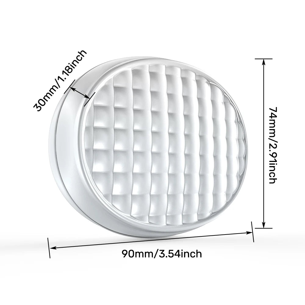 Round white light therapy device with grid pattern, shown with dimensions 90x74x30mm.